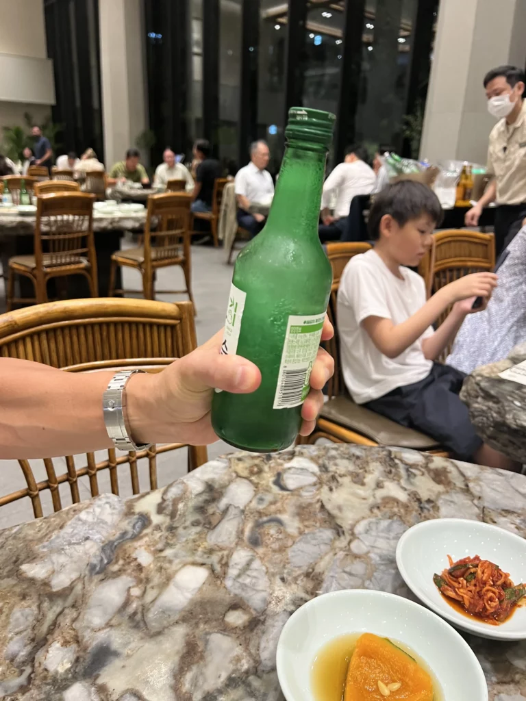 Traditional Korean soju bottle served at Samwon Garden restaurant during Hanwoo galbi Korean BBQ dining experience in Gangnam Seoul.
