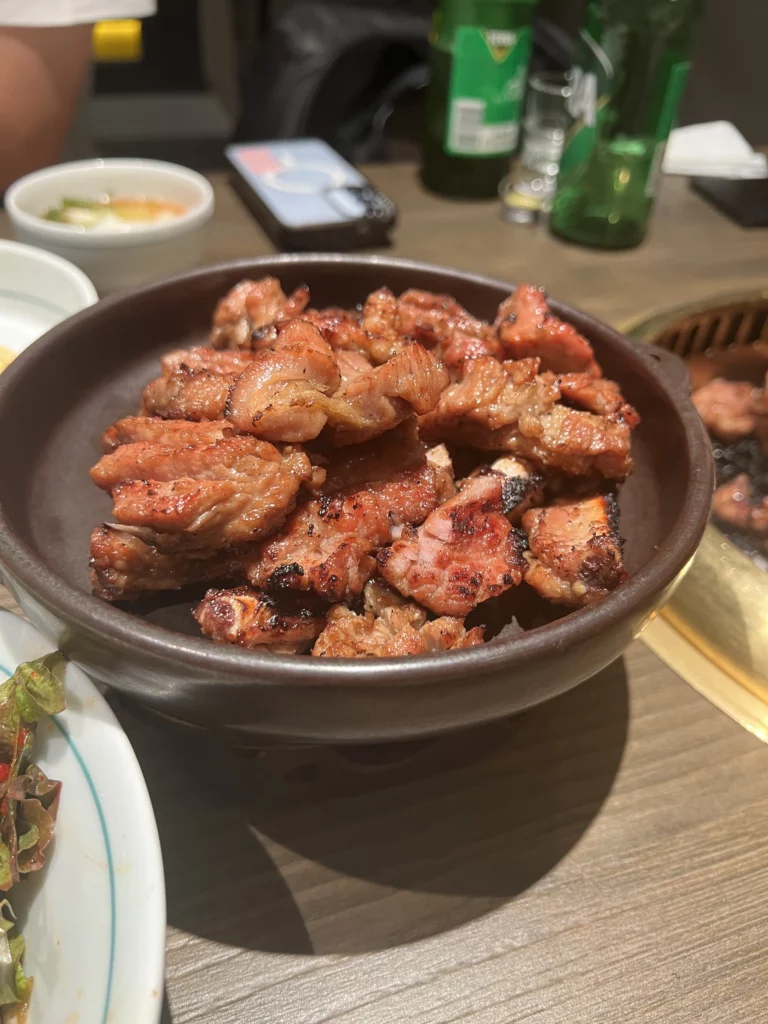 Charcoal-grilled pork ribs served at Bongpiyang Korean BBQ, a Michelin Bib Gourmand restaurant in Seoul's Gangnam district.