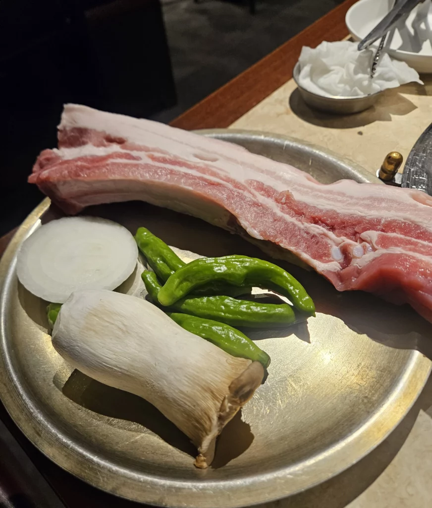 Fresh raw samgyeopsal at Keum Eun Don  K-BBQ  house waiting to be grilled. 