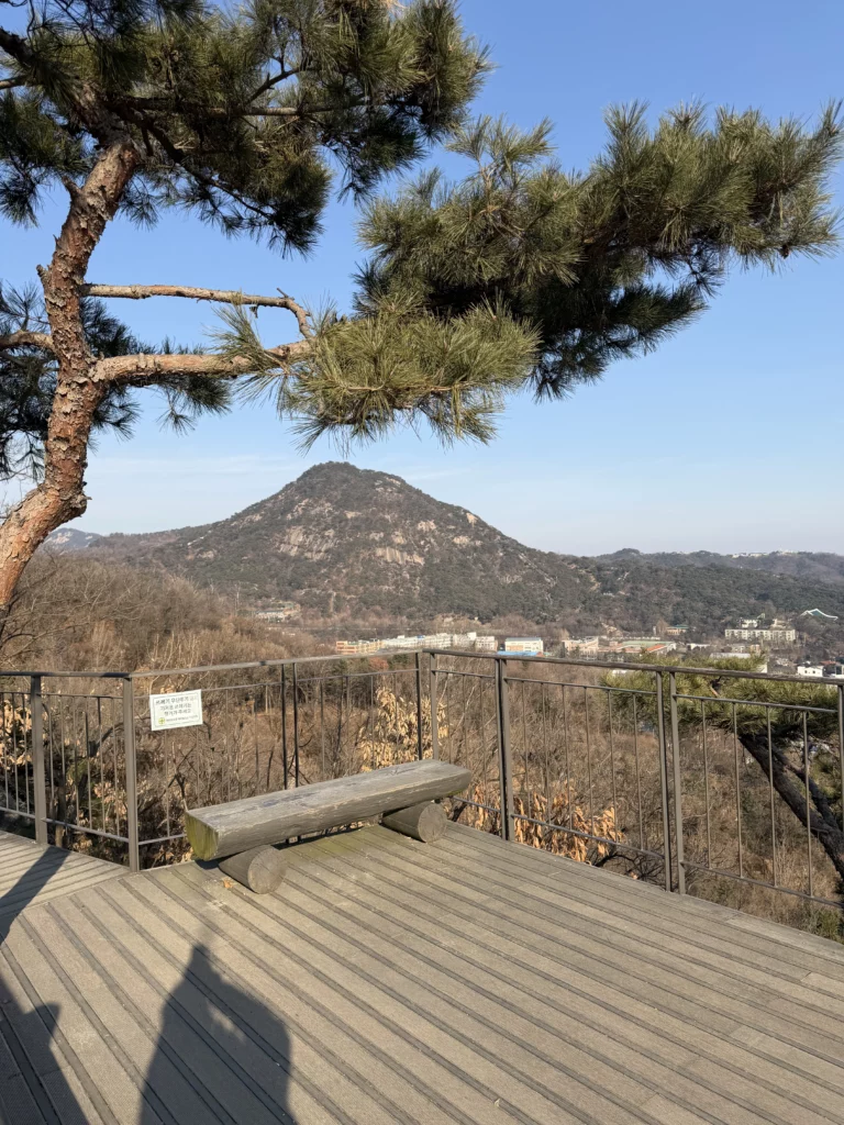 Bugaksan Mountain scenic viewpoint near Gyeyeolsa Korean fried chicken restaurant in Seoul Buam-dong hiking area.