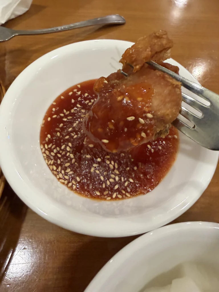 Gyeyeolsa Korean fried chicken dipped in sesame soy sauce at Seoul Buam-dong artisan restaurant near Bugaksan Mountain.
