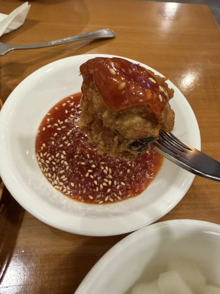 Gyeyeolsa yangnyeom Korean fried chicken with spicy sesame sauce at Seoul Buam-dong restaurant chimaek specialty.