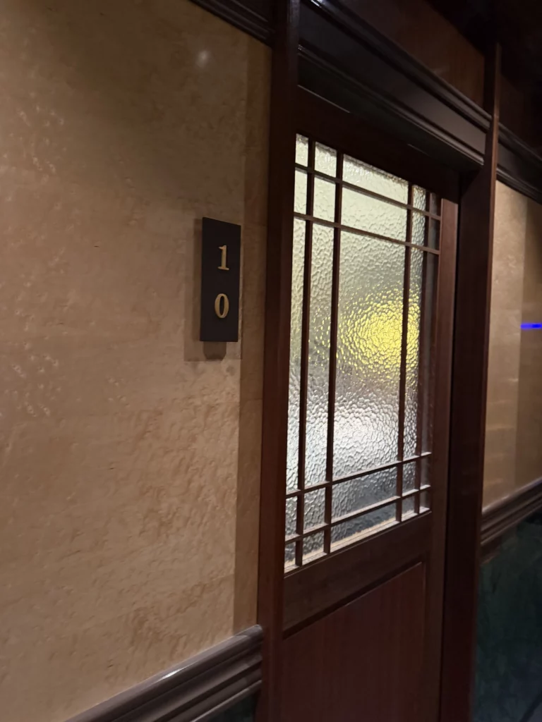Private dining room entrance with traditional Korean frosted glass door at Chowon Korean BBQ restaurant in Gangnam Seoul.