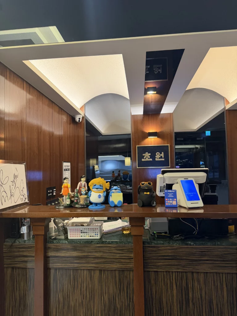 Chowon Korean BBQ restaurant reception desk with traditional decor at Gangnam Seoul location serving marinated sirloin jumulleok and premium beef tongue.