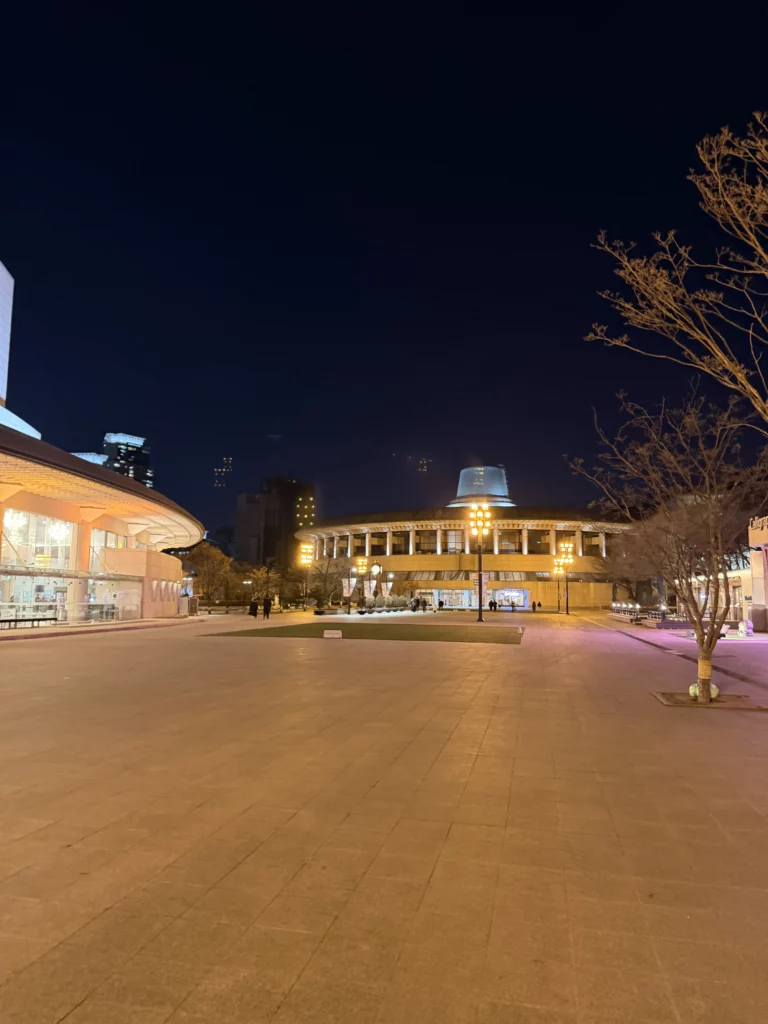 Seoul Arts Center evening view with illuminated Opera House and plaza near Dam Restaurant in Seocho-gu, premier Korean cultural complex for hanjeongsik dining and performing arts.