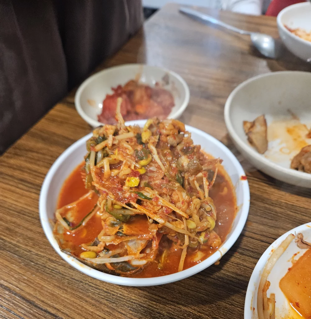 Spicy Korean side dish with bean sprouts served alongside Won Daegu-tang Cod-fish Hot Pot at Won Daegu-tang restaurant in Seoul.