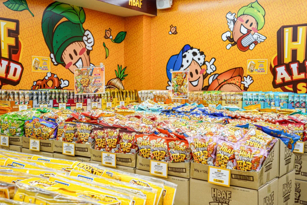 HBAF spicy almond flavors including Tteokbokki and Buldak varieties featuring gochujang-based seasoning.
