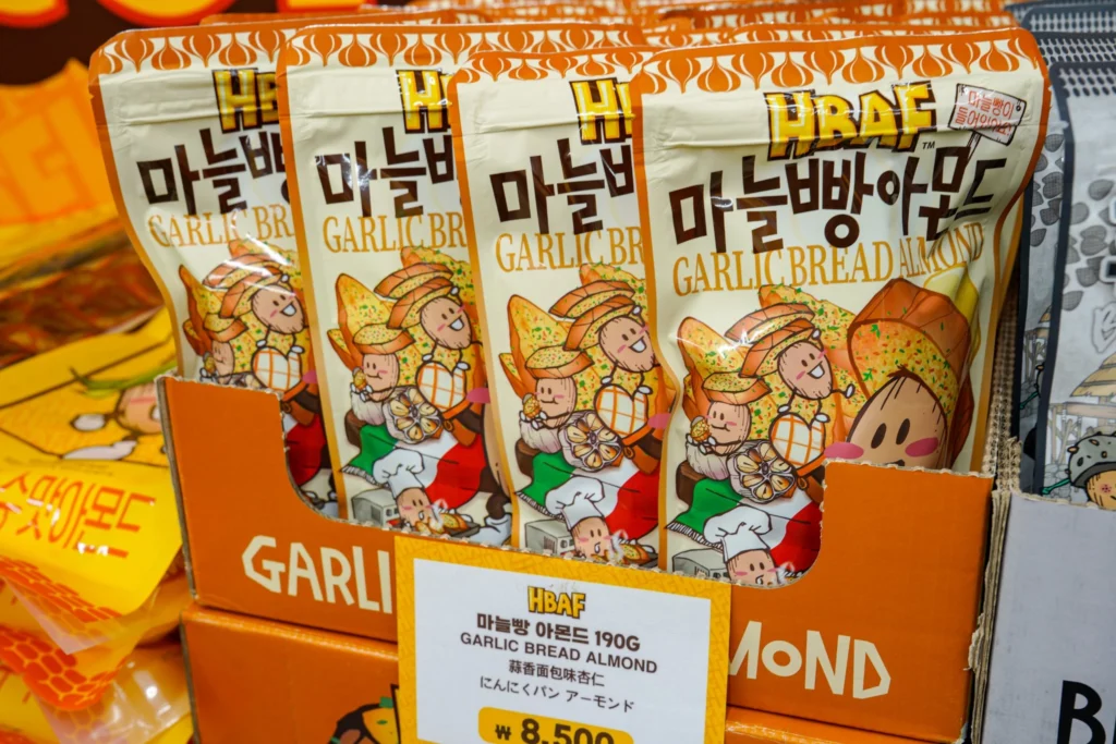 HBAF Garlic Bread Almond bag at the Gwangjang Market store, highlighting the savory buttery flavor option.