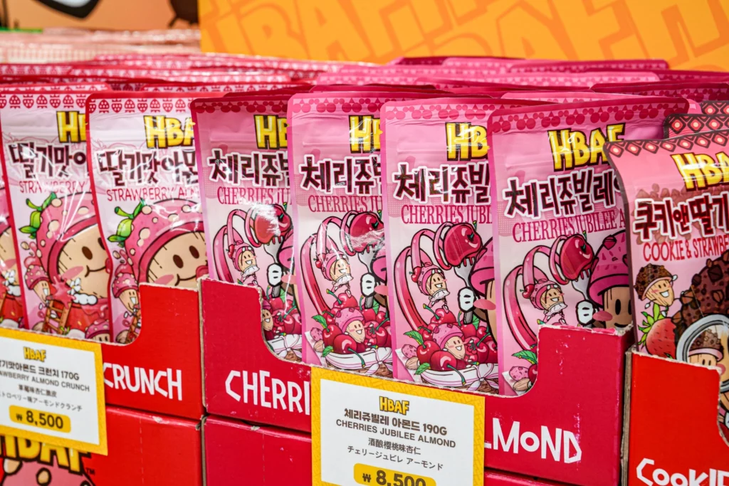 HBAF Cherry Jubilee Almond bag with bright fruit-themed packaging at the Gwangjang Market snack store.

