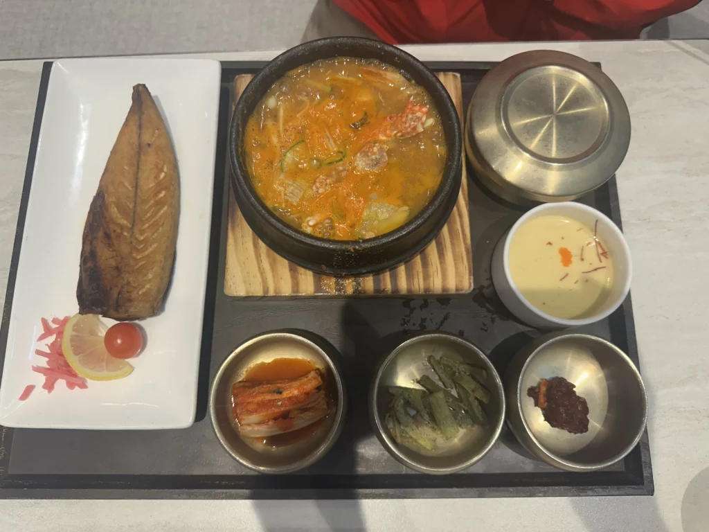 Grilled mackerel and stew set served at an Incheon Airport Korean restaurant