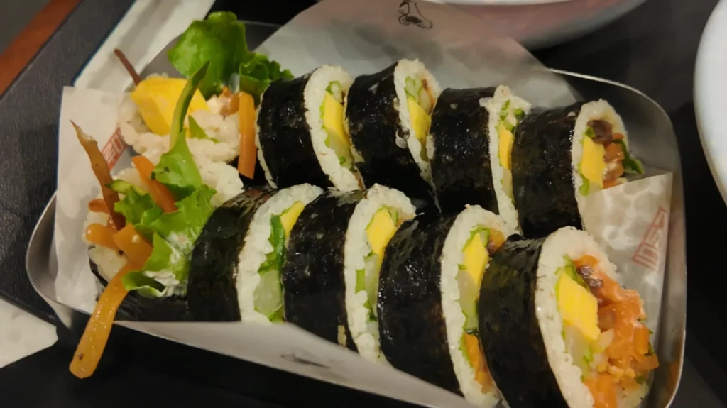 Durumi Bunsik meal tray with kimbap, tteokbokki, and eomuk soup served together