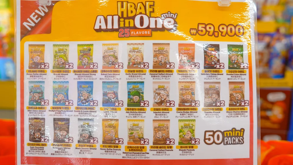 HBAF All-in-One Mini 25-flavor variety gift box poster listing 50 mini packs for ₩59,900 at the Myeongdong store.