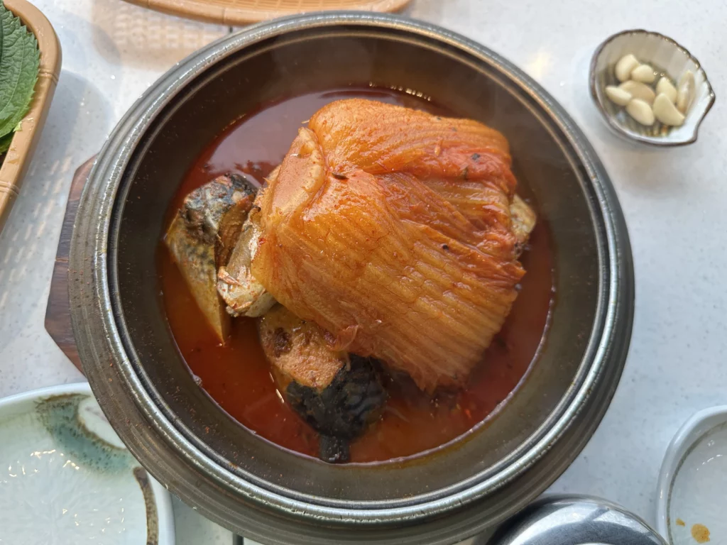 Godeungeo mugeunji-jjim, the signature braised mackerel with aged kimchi at this BTS favorite Jeju restaurant